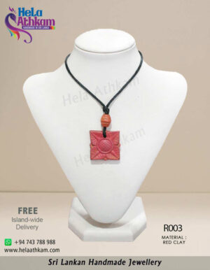 Handmade red clay pendant with square shape and beautiful flower engraving.