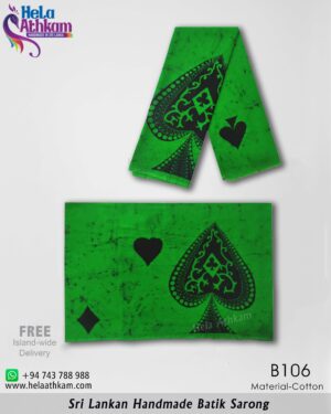Handmade batik sarong with black and green ace design.