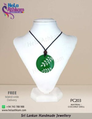 Sri Lankan handmade coconut shell pendant in green colour and beautiful leaves.