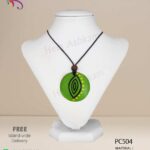 Sri Lankan handmade coconut shell pendant with beautiful light green design.