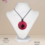 Handmade Sri Lankan coconut shell pendant with beautiful tulip design.