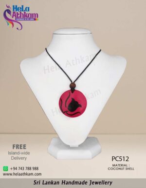 Handmade Sri Lankan coconut shell pendant with beautiful tulip design.