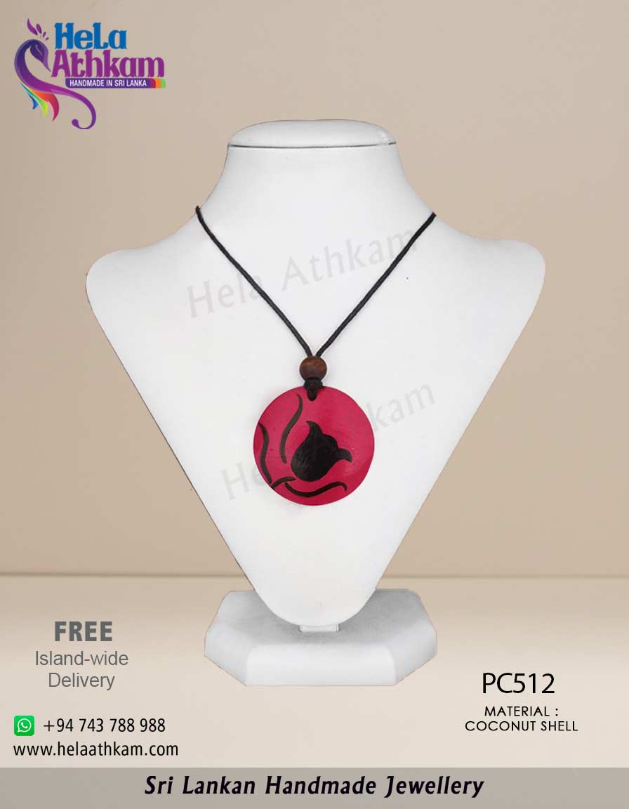 Handmade Sri Lankan coconut shell pendant with beautiful tulip design.