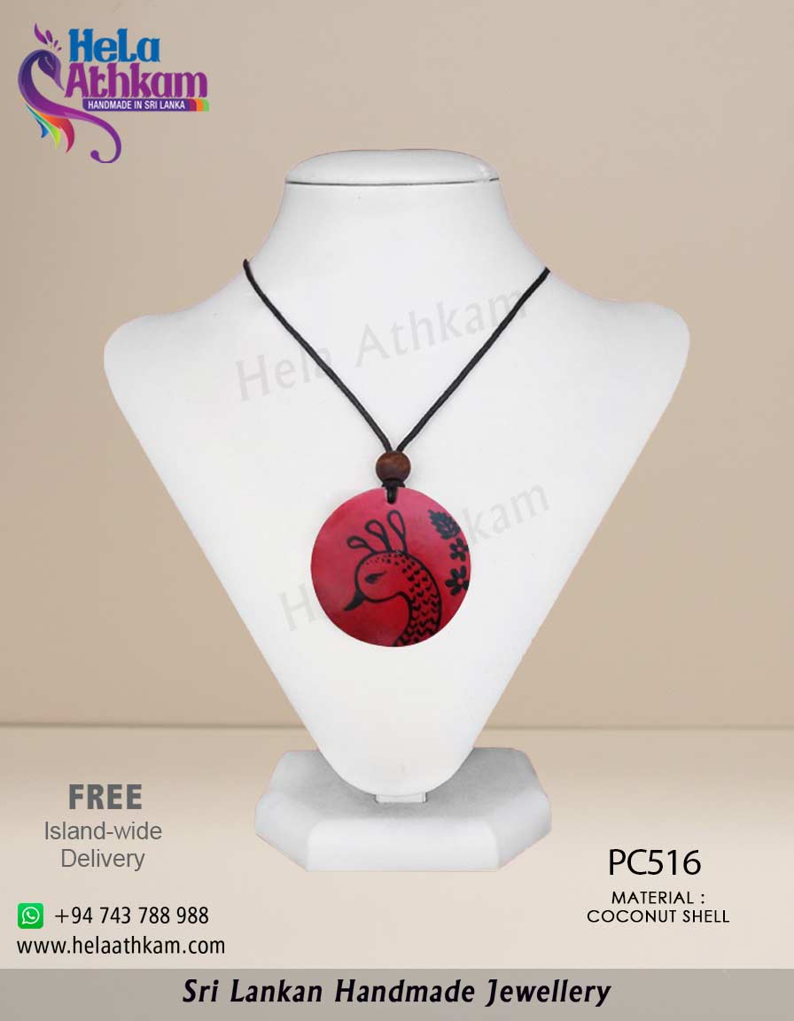 Hela Athkam Handmade Batik Product Image Sri Lankan handmade coconut shell jewellery with beautiful red and black peacock design.