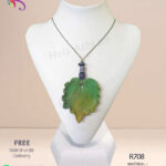 Beautiful green leaf pendant made from red clay by hand.