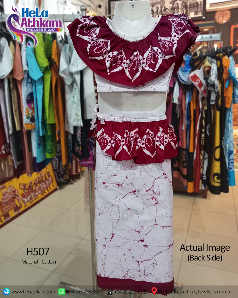 Sri Lankan handmade batik clothing kids lamasaree with maroon coloured cracklings and patterns on a white background actual image of the back view.