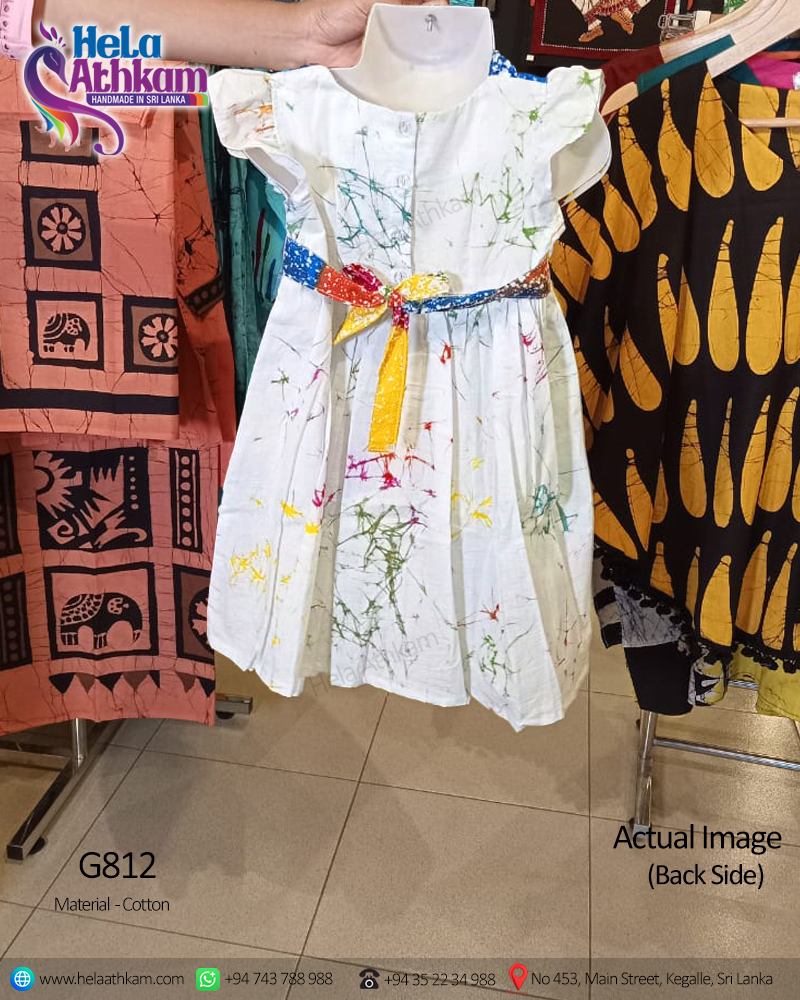 Beautiful Sri Lankan handmade kid's batik frock for children in multi coloured crackling design at the back actual image of the back view.