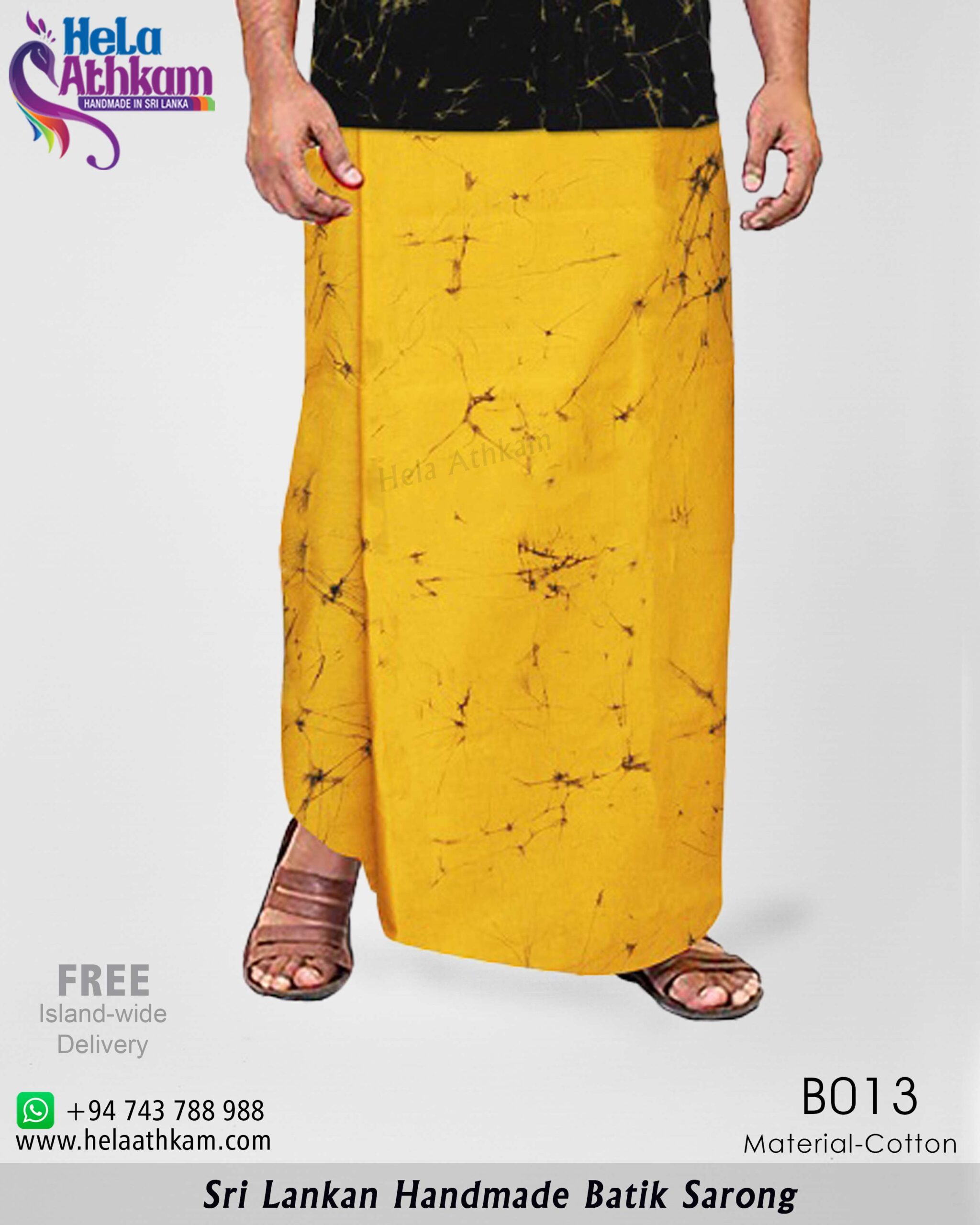 Hela Athkam Handmade Batik Product Image Yellow handmade batik sarong with black cracking design.