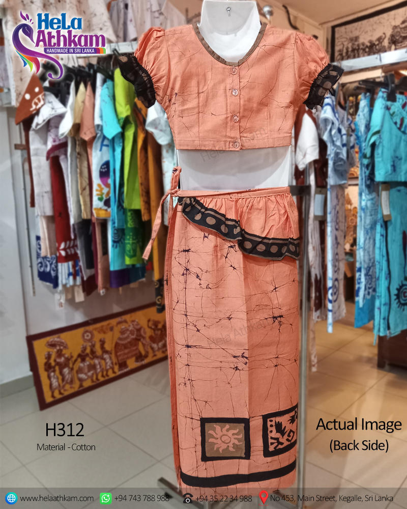 Sri Lankan handmade batik lama saree for kids with light brown and black colours actual image of the back view.