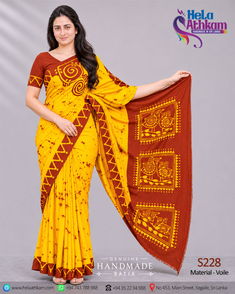 Sri Lankan handmade batik saree made by Hela Athkam showing how the design looks when worn as a saree.