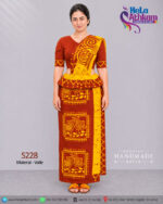 Sri Lankan handmade batik osariya made by Hela Athkam using beautiful combination of golder yellow and brown colors.