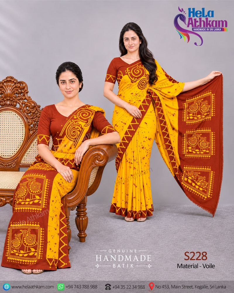 Sri Lankan handmade batik saree and osariya made by Hela Athkam using an artistic combination of golden yellow and brown colors.