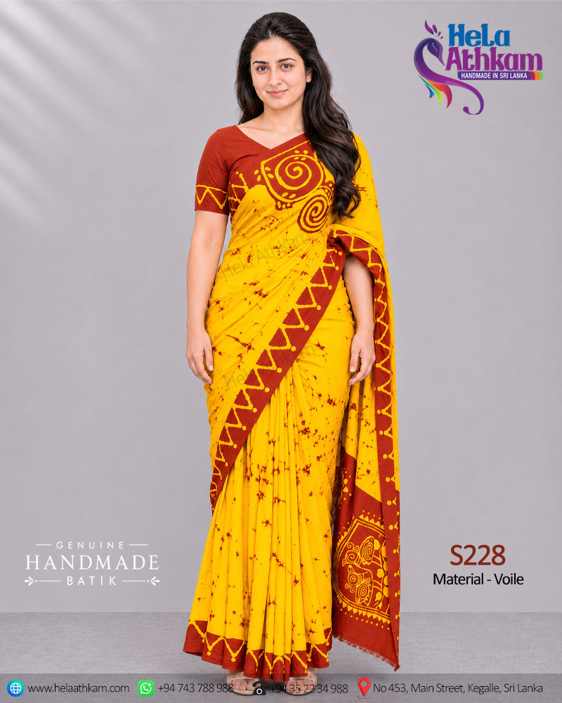 Sri Lankan handmade batik saree made by Hela Athkam using golden yellow and brown colors.
