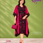 Sri Lankan handmade batik clothing product image with black and magenta colored kaftan with the design of leaves and geometric patterns