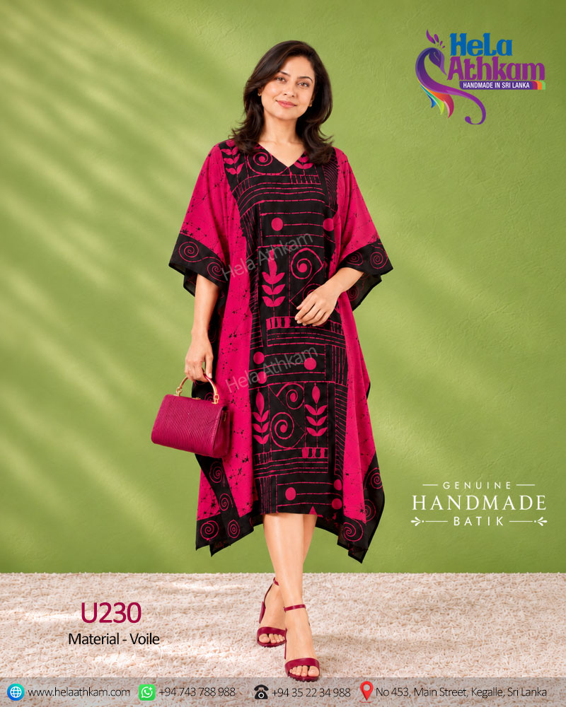 Sri Lankan handmade batik clothing product image with black and magenta colored kaftan with the design of leaves and geometric patterns